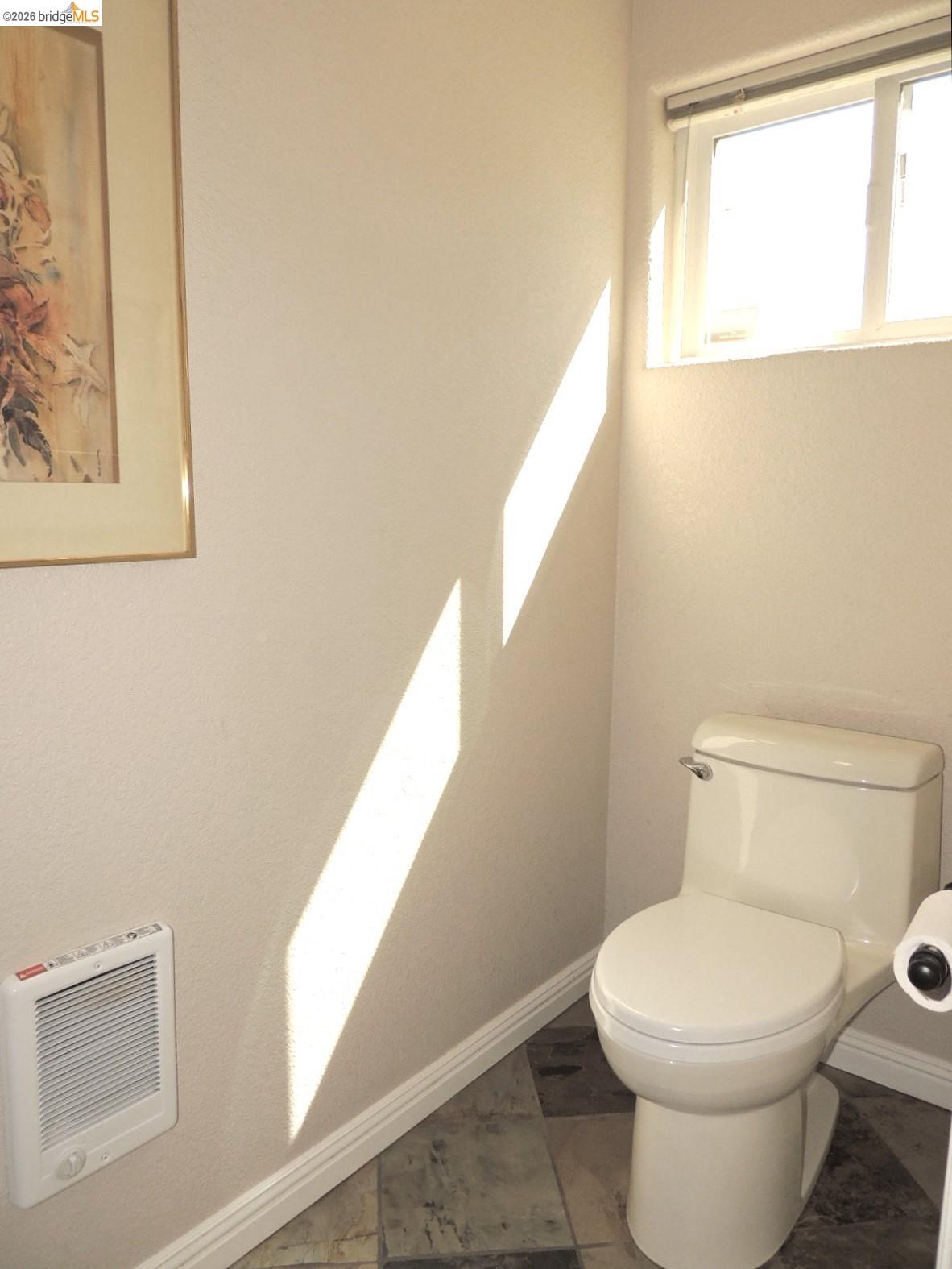 5356 Dogtown Road Coulterville, CA 95311 - Photo 44 of 60 a white toilet sitting next to a window