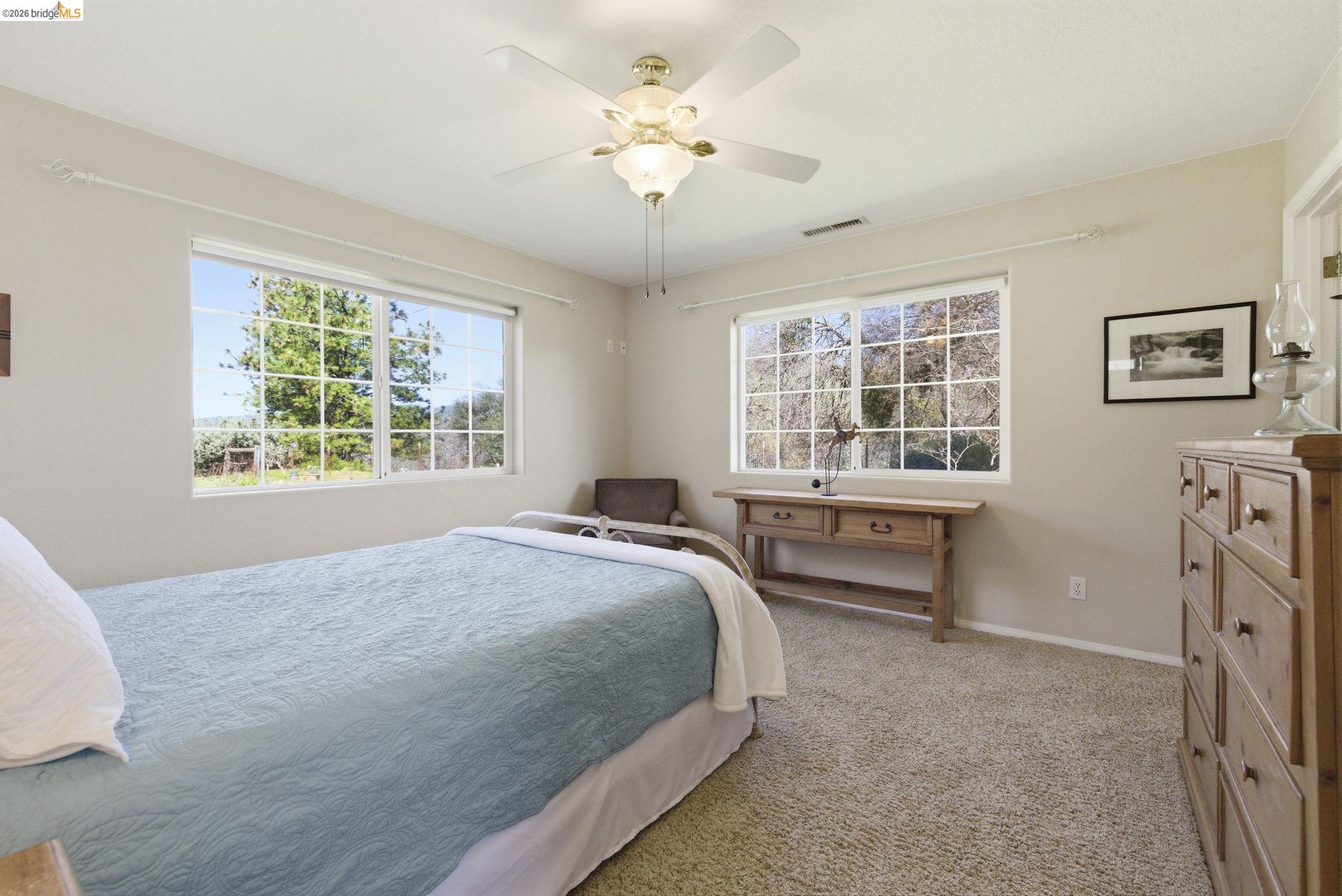5356 Dogtown Road Coulterville, CA 95311 - Photo 47 of 60 a bed room with a bed and a window
