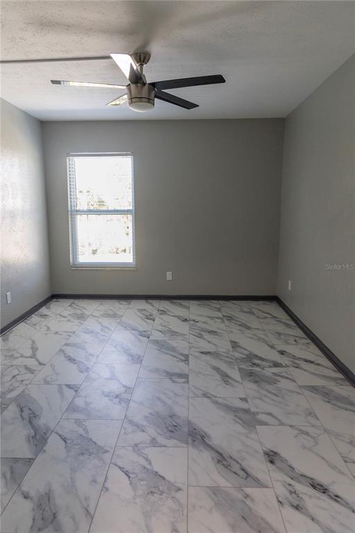 1799 North Highland Avenue, Unit 126 Clearwater, FL 33755 - Photo 15 of 20 a view of an empty room with a window