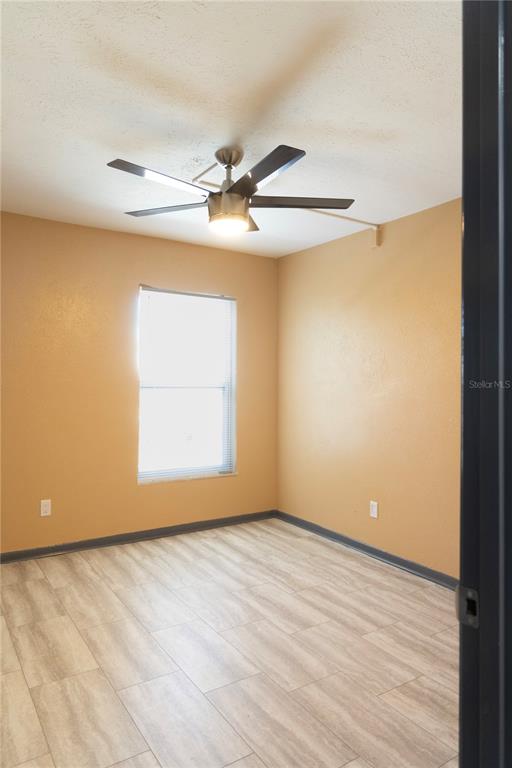 1799 North Highland Avenue, Unit 126 Clearwater, FL 33755 - Photo 17 of 20 a view of an empty room with a window