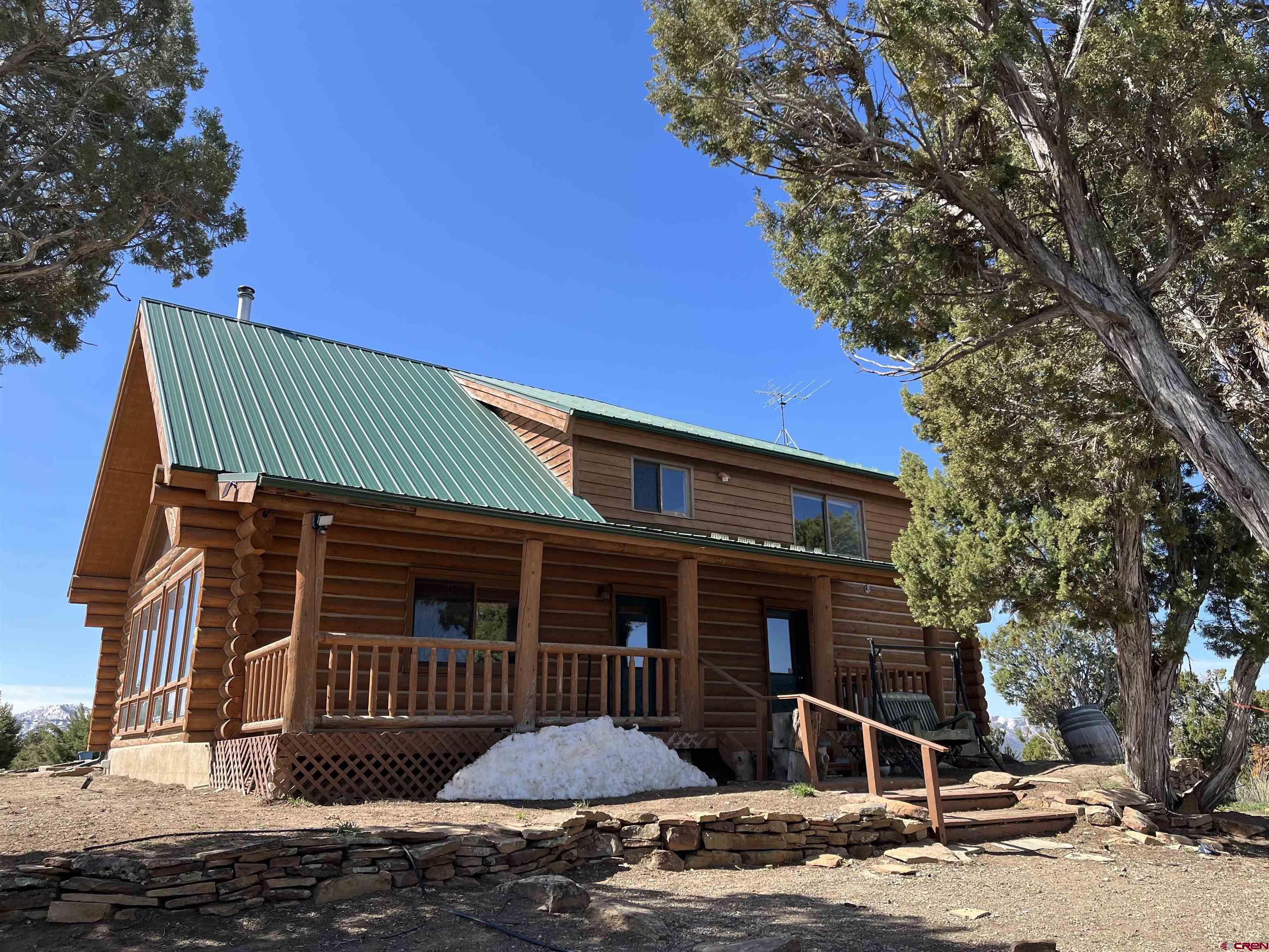 9571 Road 35 Mancos, CO 81328 - Photo 3 of 32 a front view of a house
