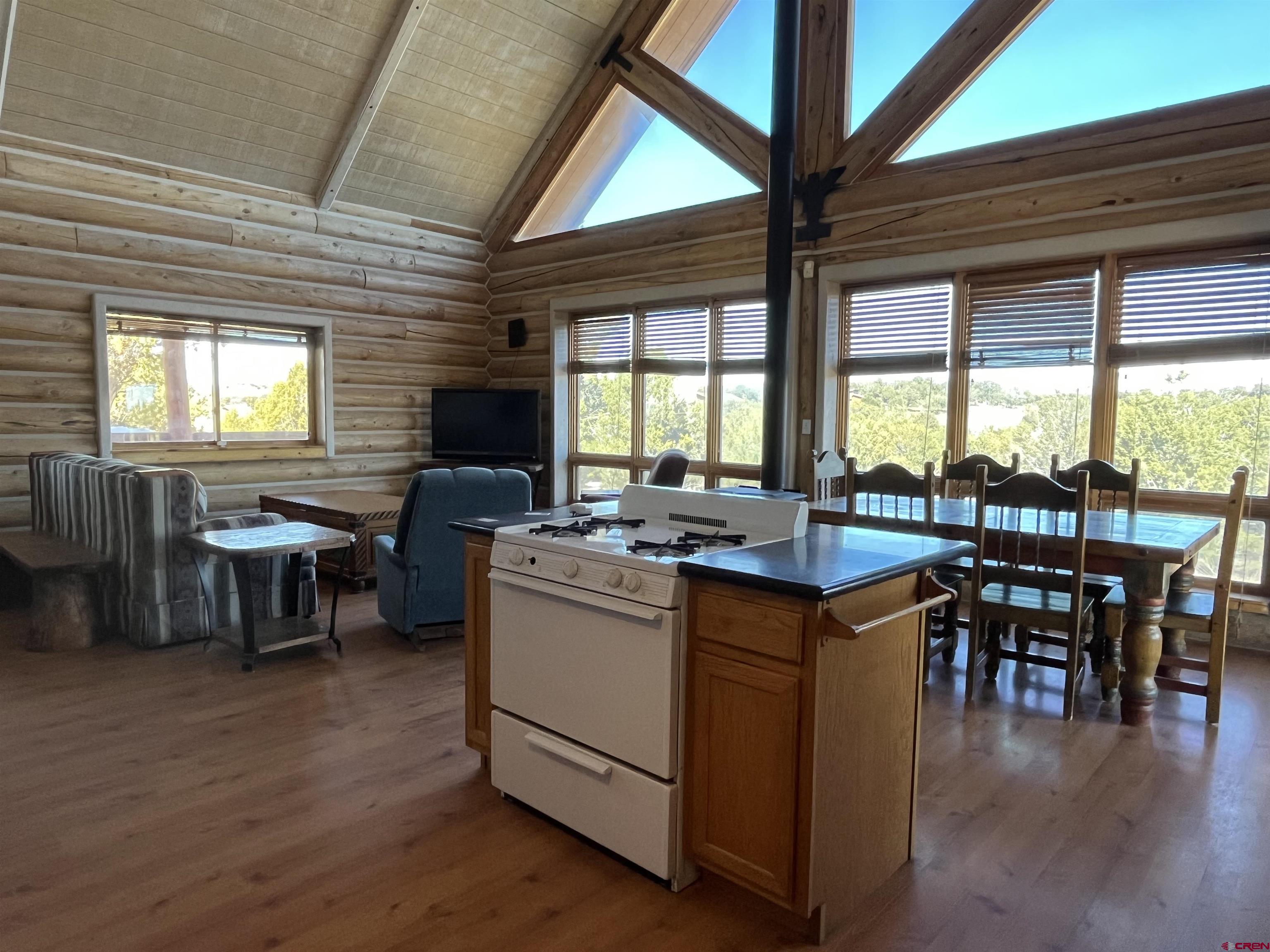 9571 Road 35 Mancos, CO 81328 - Photo 8 of 32 a view of a dining room with furniture window and outside view