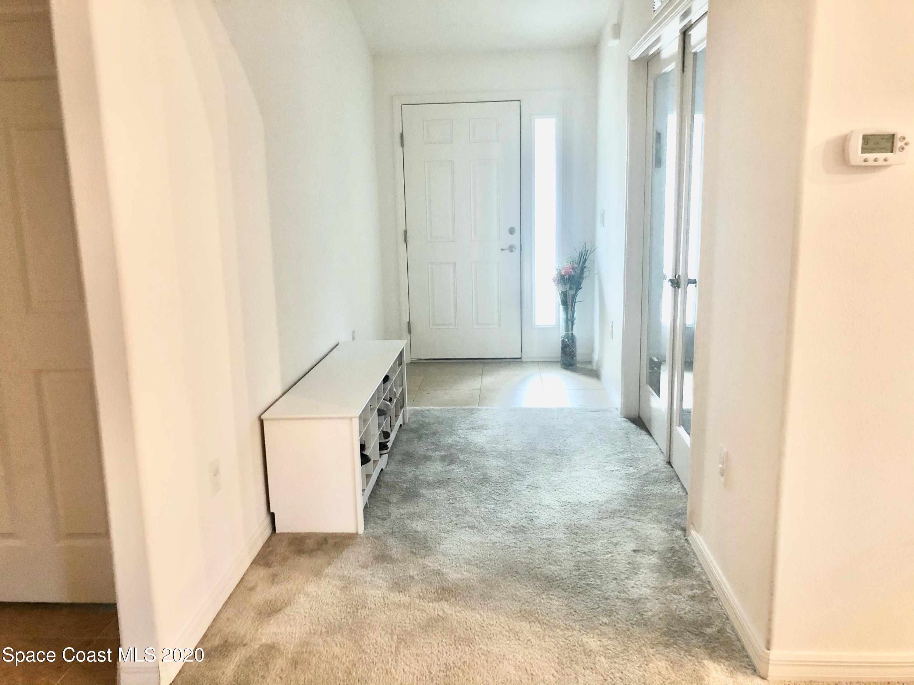 1143 Harlingen Road Southwest, Unit 32 Palm Bay, FL 32908 - Photo 4 of 11 a view of a storage & utility room