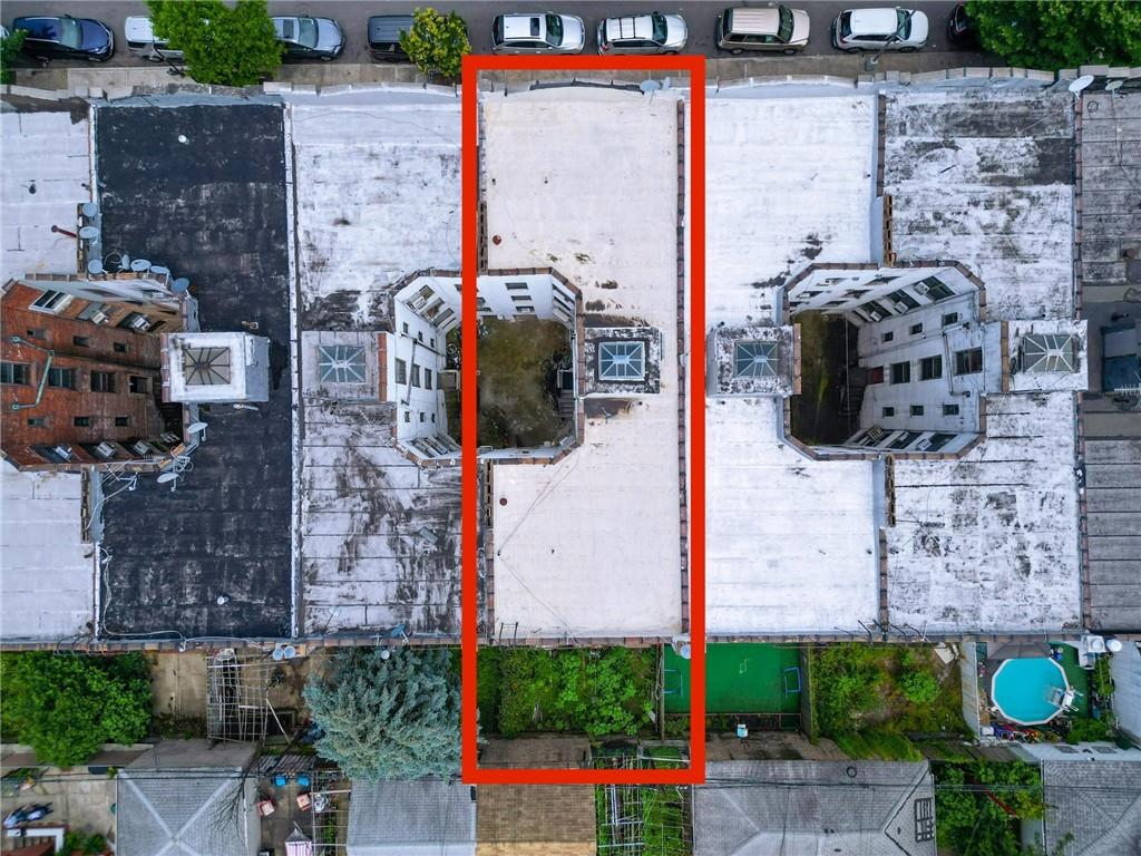 1748 79th Street Brooklyn, NY 11214 - Photo 14 of 20 an aerial view of a house with a yard and large trees