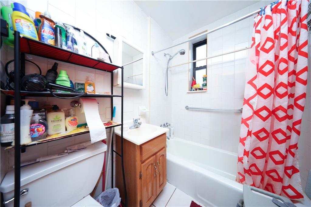 1748 79th Street Brooklyn, NY 11214 - Photo 10 of 20 a utility room with dryer and washer