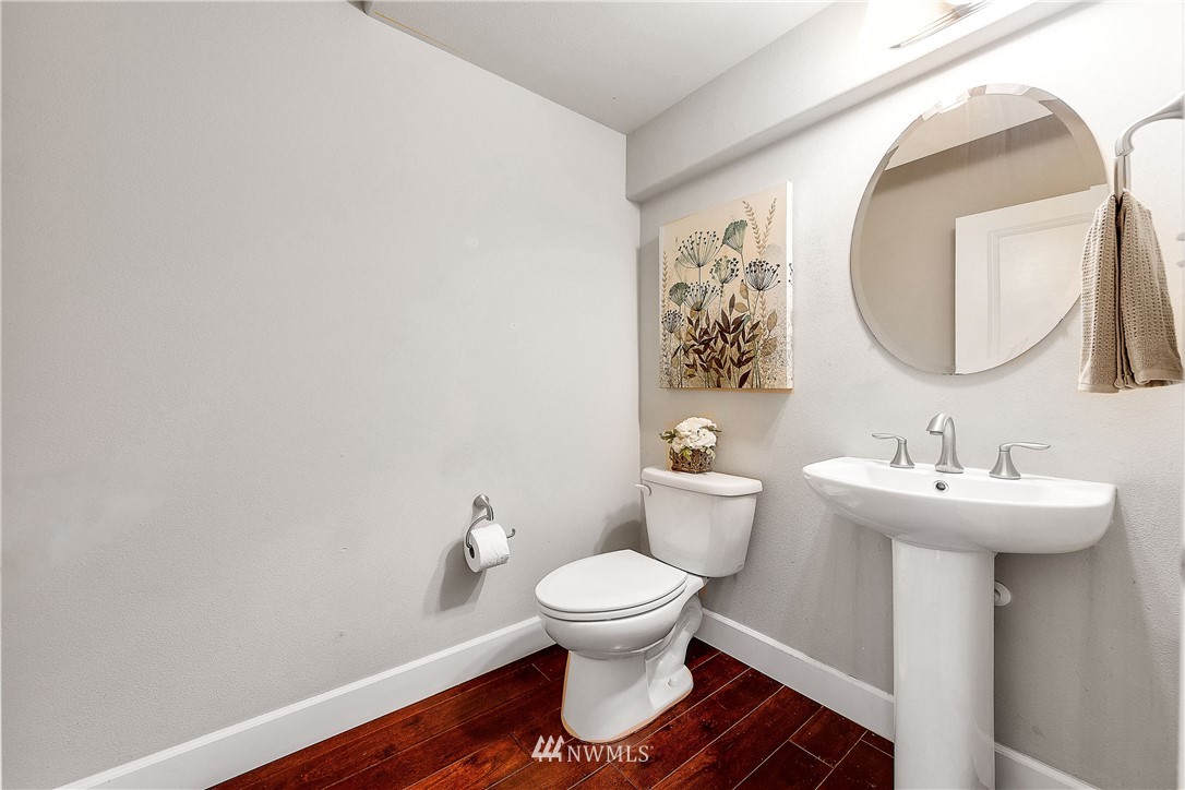 20057 94th Avenue Northeast, Unit 36 Bothell, WA 98011 - Photo 12 of 31 a bathroom with a toilet sink and mirror
