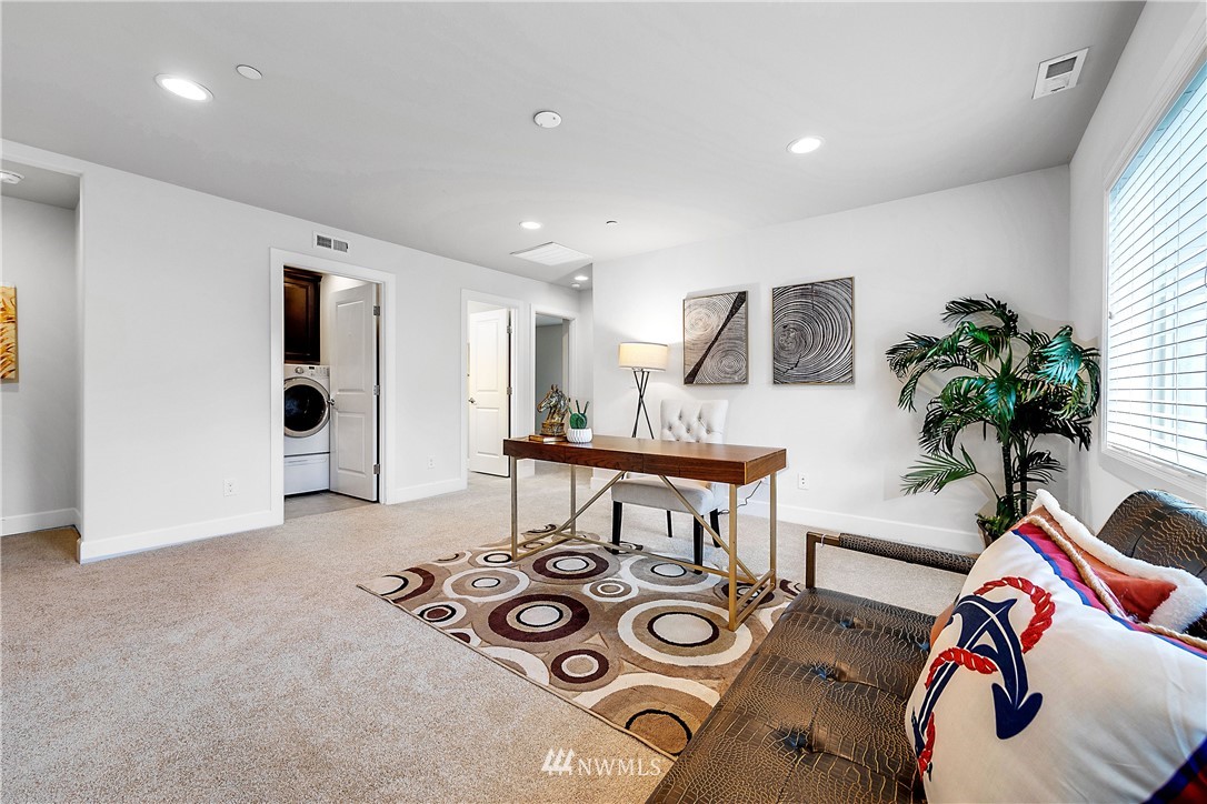 20057 94th Avenue Northeast, Unit 36 Bothell, WA 98011 - Photo 14 of 31 a view of a livingroom with furniture and window