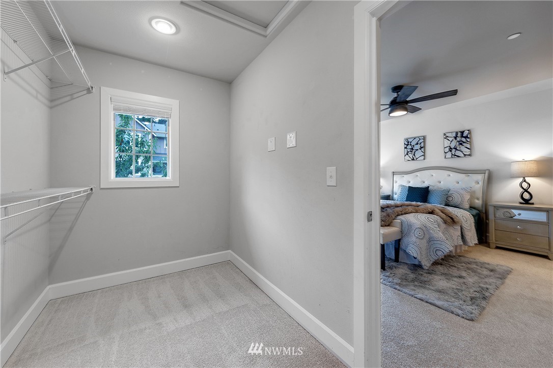 20057 94th Avenue Northeast, Unit 36 Bothell, WA 98011 - Photo 18 of 31 a bedroom with a bed and a window
