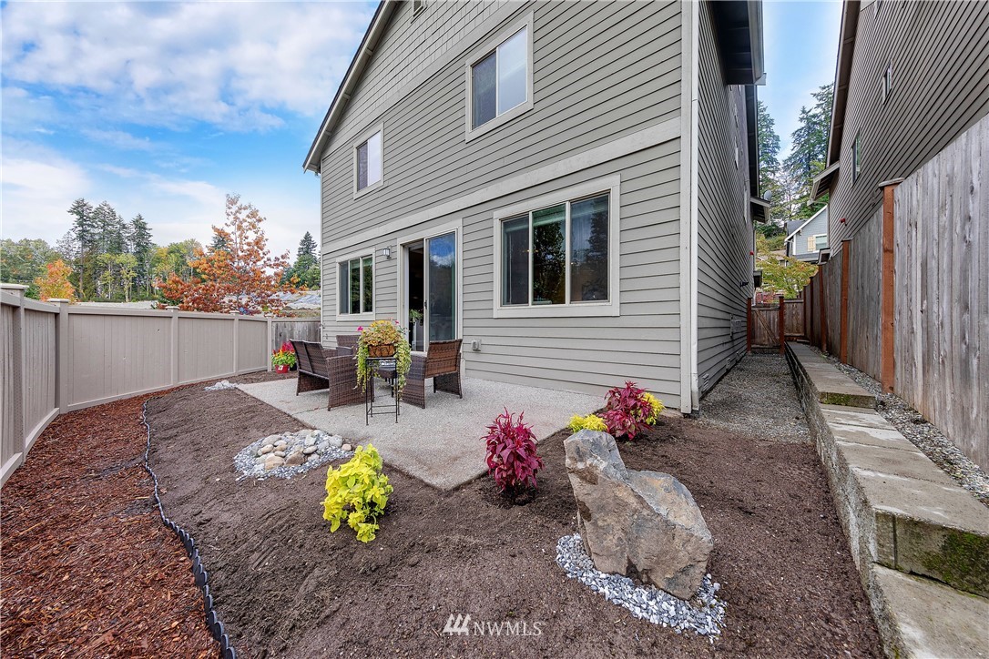 20057 94th Avenue Northeast, Unit 36 Bothell, WA 98011 - Photo 28 of 31 a view of a house with sitting area
