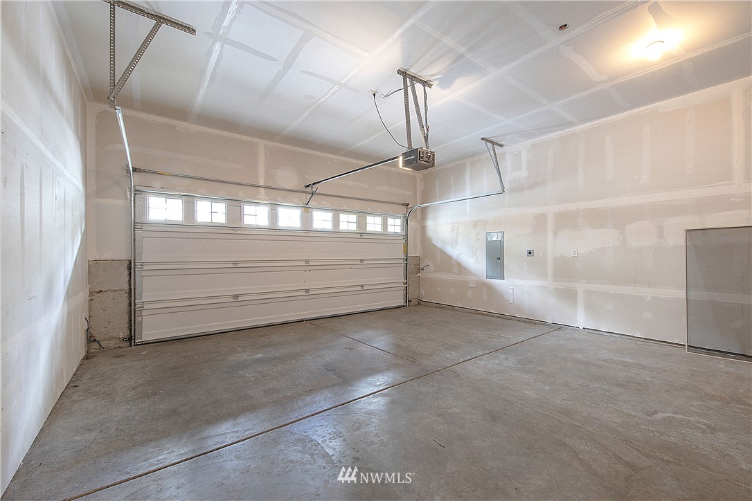20057 94th Avenue Northeast, Unit 36 Bothell, WA 98011 - Photo 29 of 31 a view of a room with racks on the wall