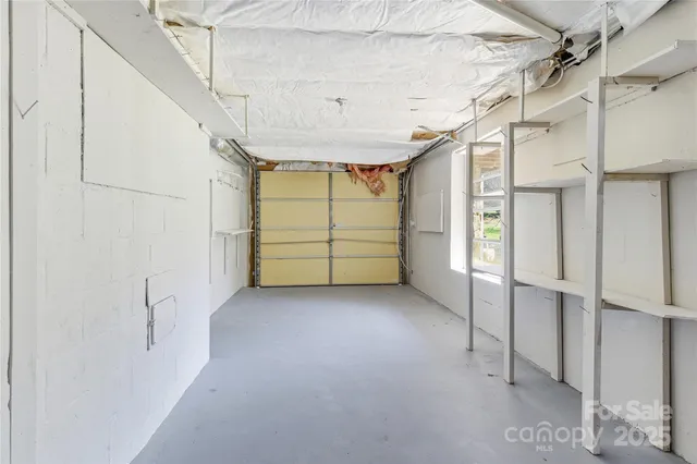 a view of a room with racks on the wall