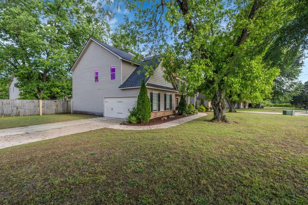 126 Meadow's Walk Drive Byron, GA 31008 - Photo 2 of 37 a front view of house with yard and green space