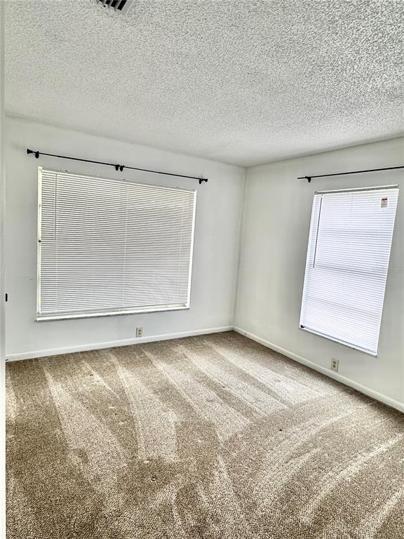 1541 Southeast 27th Street, Unit F Ocala, FL 34471 - Photo 23 of 25 a view of a room that has a window