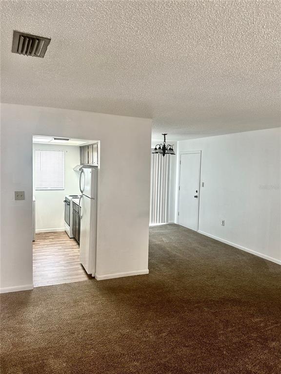 1541 Southeast 27th Street, Unit F Ocala, FL 34471 - Photo 8 of 25 an empty room with a empty space and windows