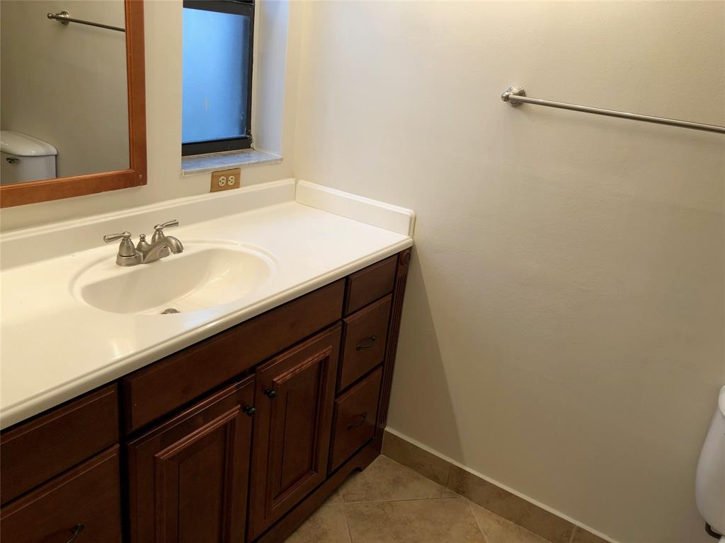 9488 Majestic Way Boynton Beach, FL 33437 - Photo 9 of 15 a bathroom with a sink and a mirror