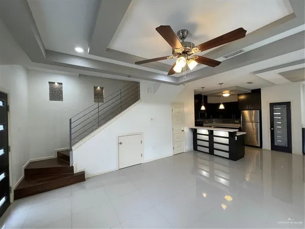 a view of work space with stairs and furniture