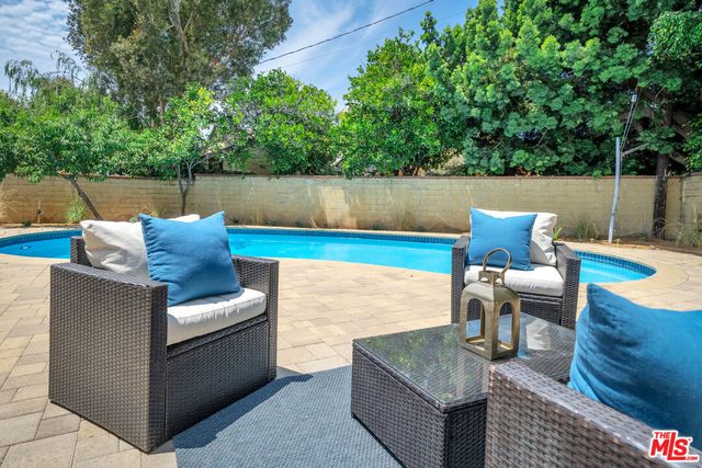 a view of sitting area in back yard