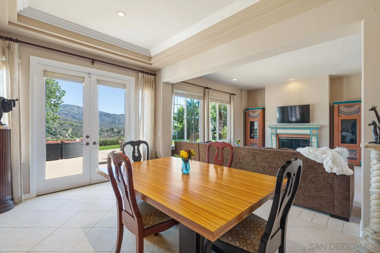 17065 Butterfield Trail Poway, CA 92064 - Photo 11 of 71 a view of a dining room with furniture window and outside view
