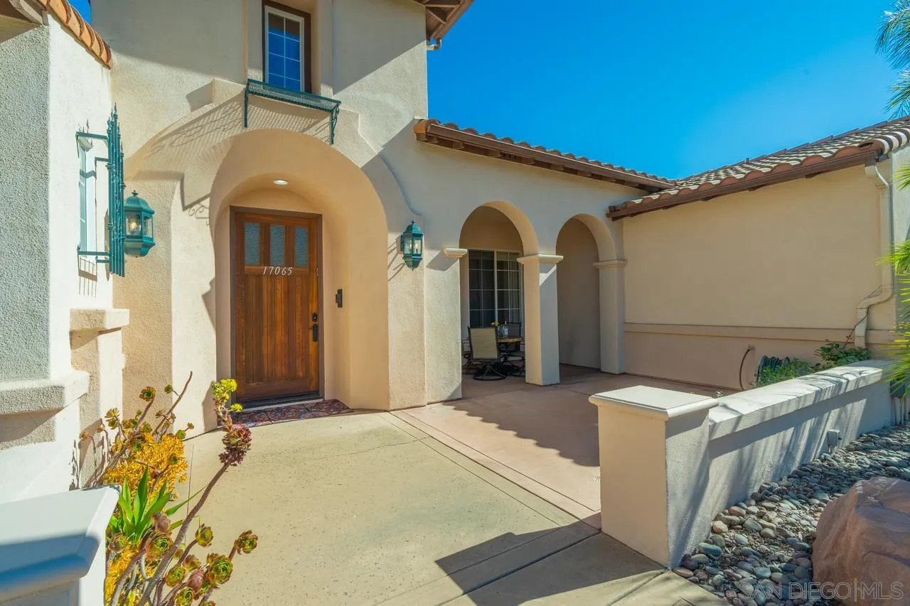 17065 Butterfield Trail Poway, CA 92064 - Photo 4 of 71 a front view of a house with a yard