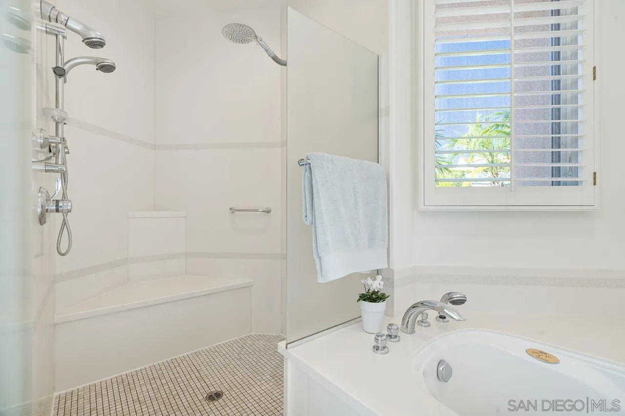17065 Butterfield Trail Poway, CA 92064 - Photo 41 of 71 a bathroom with a bathtub and a shower