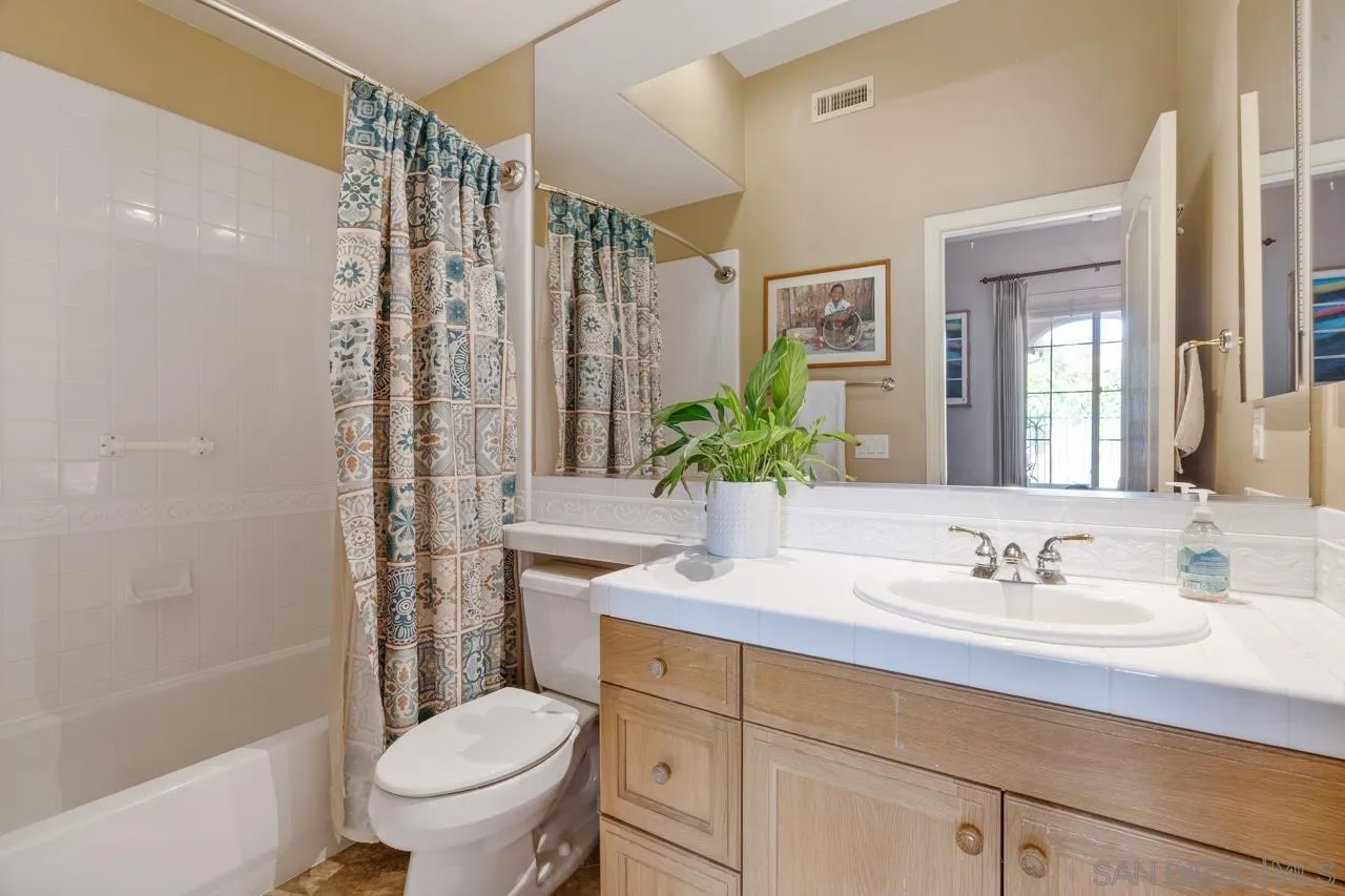 17065 Butterfield Trail Poway, CA 92064 - Photo 46 of 71 a bathroom with a sink toilet and shower