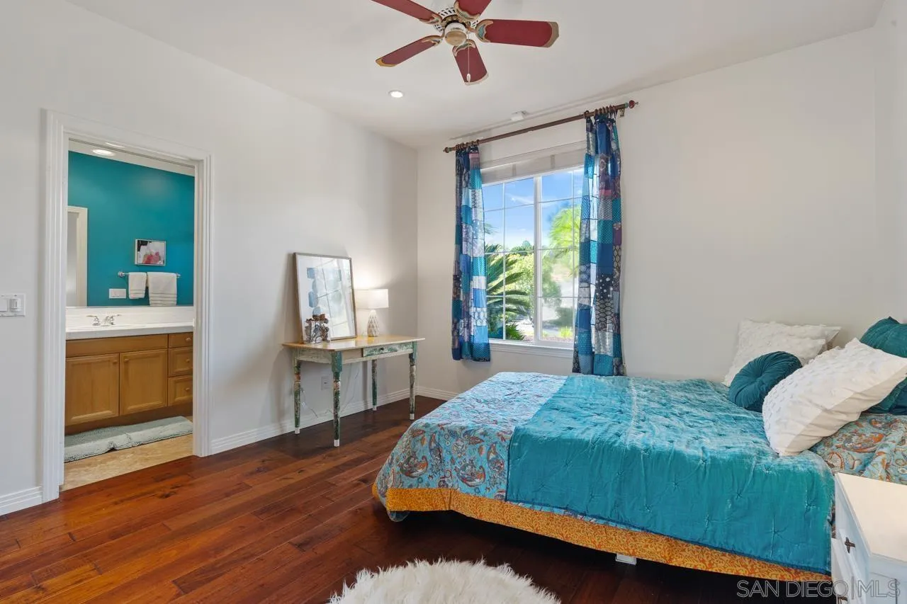 17065 Butterfield Trail Poway, CA 92064 - Photo 47 of 71 a bedroom with a bed and a view of bedroom