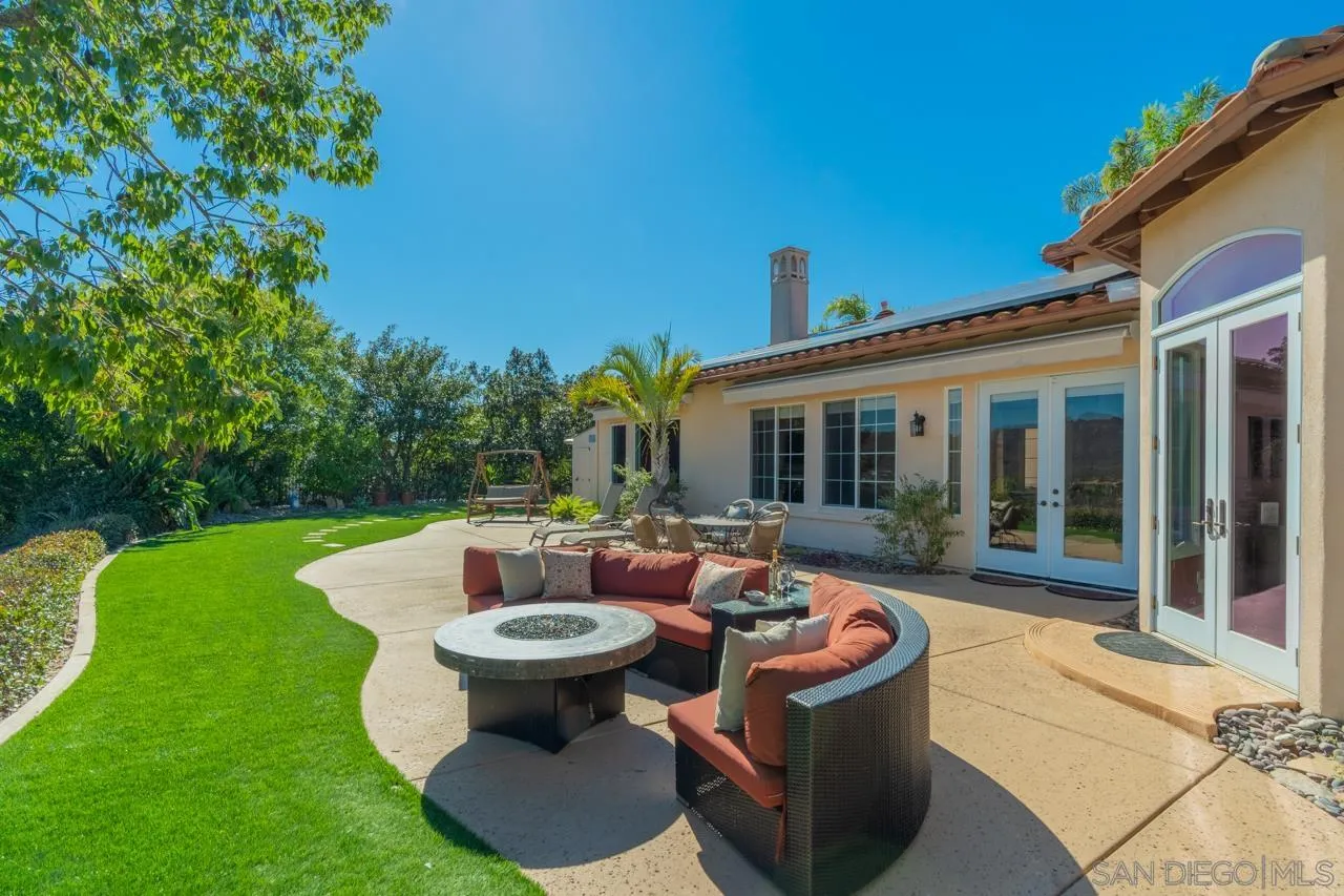 17065 Butterfield Trail Poway, CA 92064 - Photo 54 of 71 a view of a house with backyard sitting area and garden