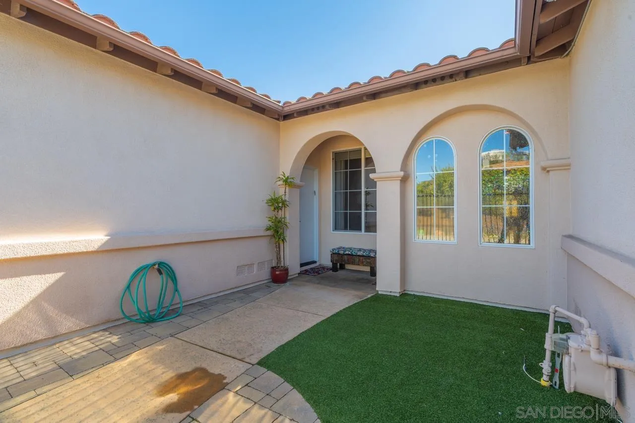 17065 Butterfield Trail Poway, CA 92064 - Photo 55 of 71 a view of front door of house with outdoor space