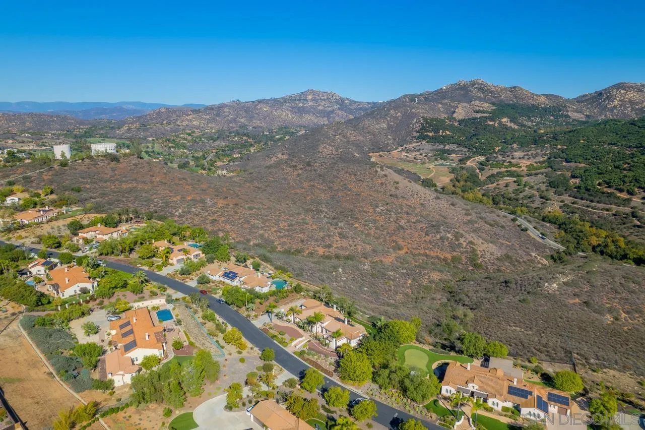 17065 Butterfield Trail Poway, CA 92064 - Photo 66 of 71 a view of a lake with mountains in the background