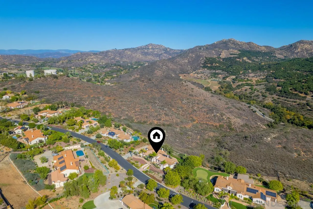 17065 Butterfield Trail Poway, CA 92064 - Photo 68 of 71 a view of a street with a mountain in the background