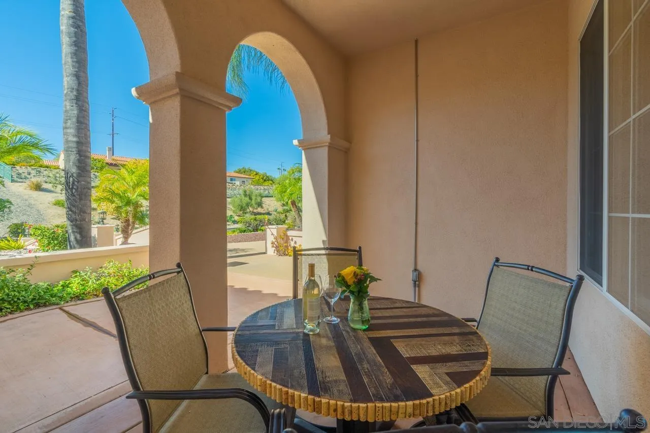 17065 Butterfield Trail Poway, CA 92064 - Photo 7 of 71 a view of a dining room with furniture window and wooden floor