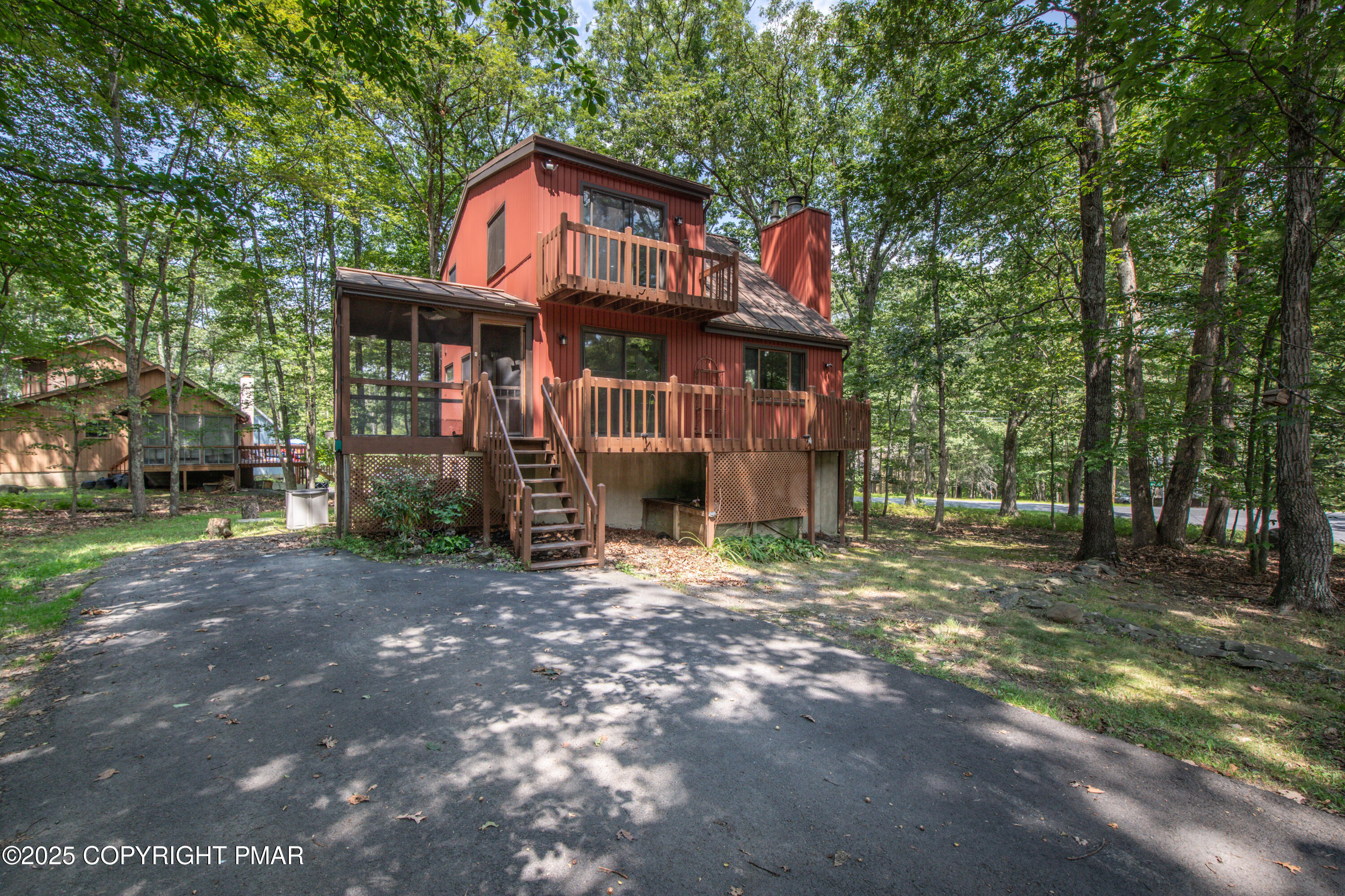 106 Carnforth Drive Bushkill, PA 18324 - Photo 1 of 73 a front view of a house with a yard