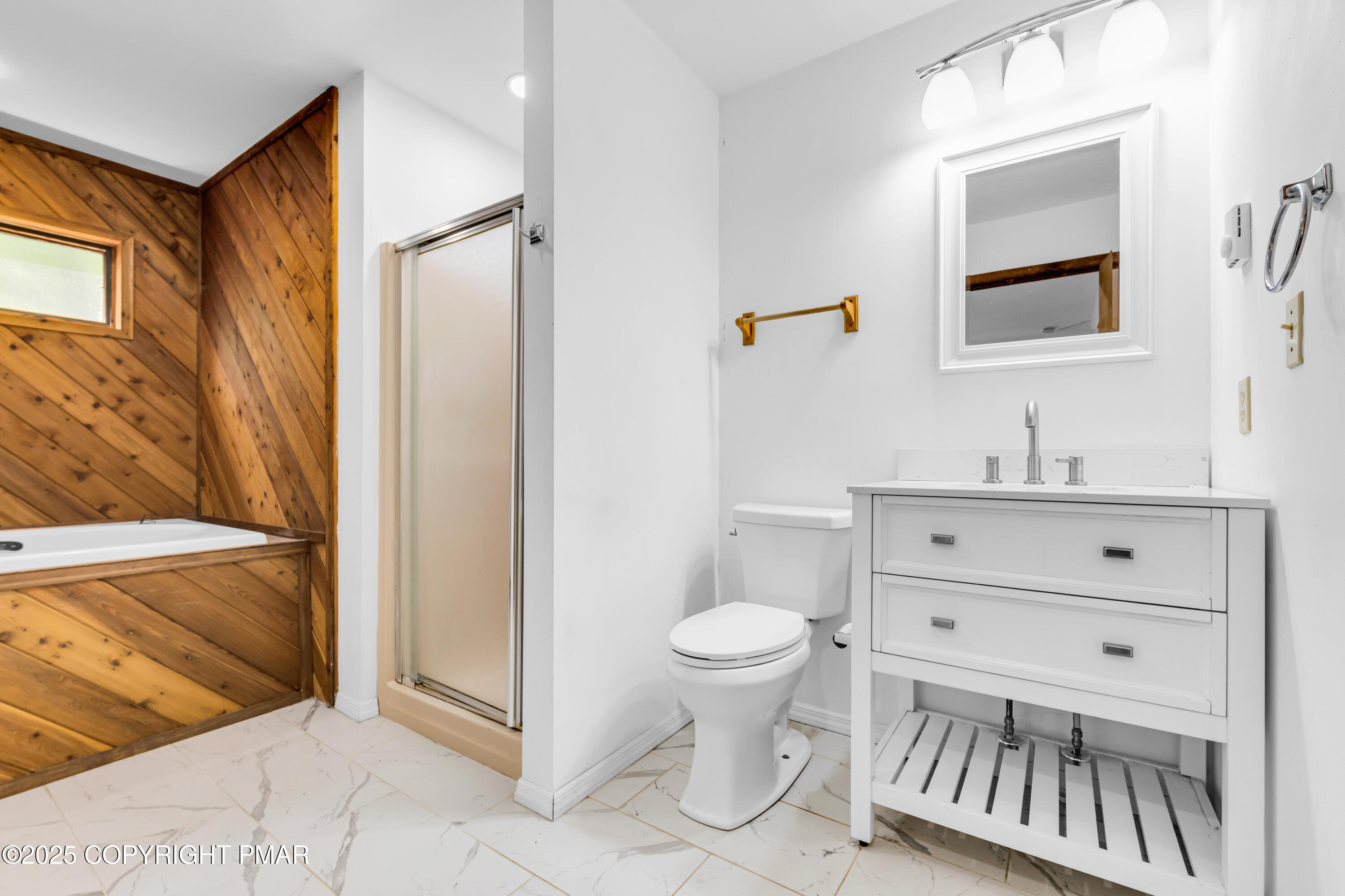 106 Carnforth Drive Bushkill, PA 18324 - Photo 15 of 73 a bathroom with a sink toilet a mirror and shower