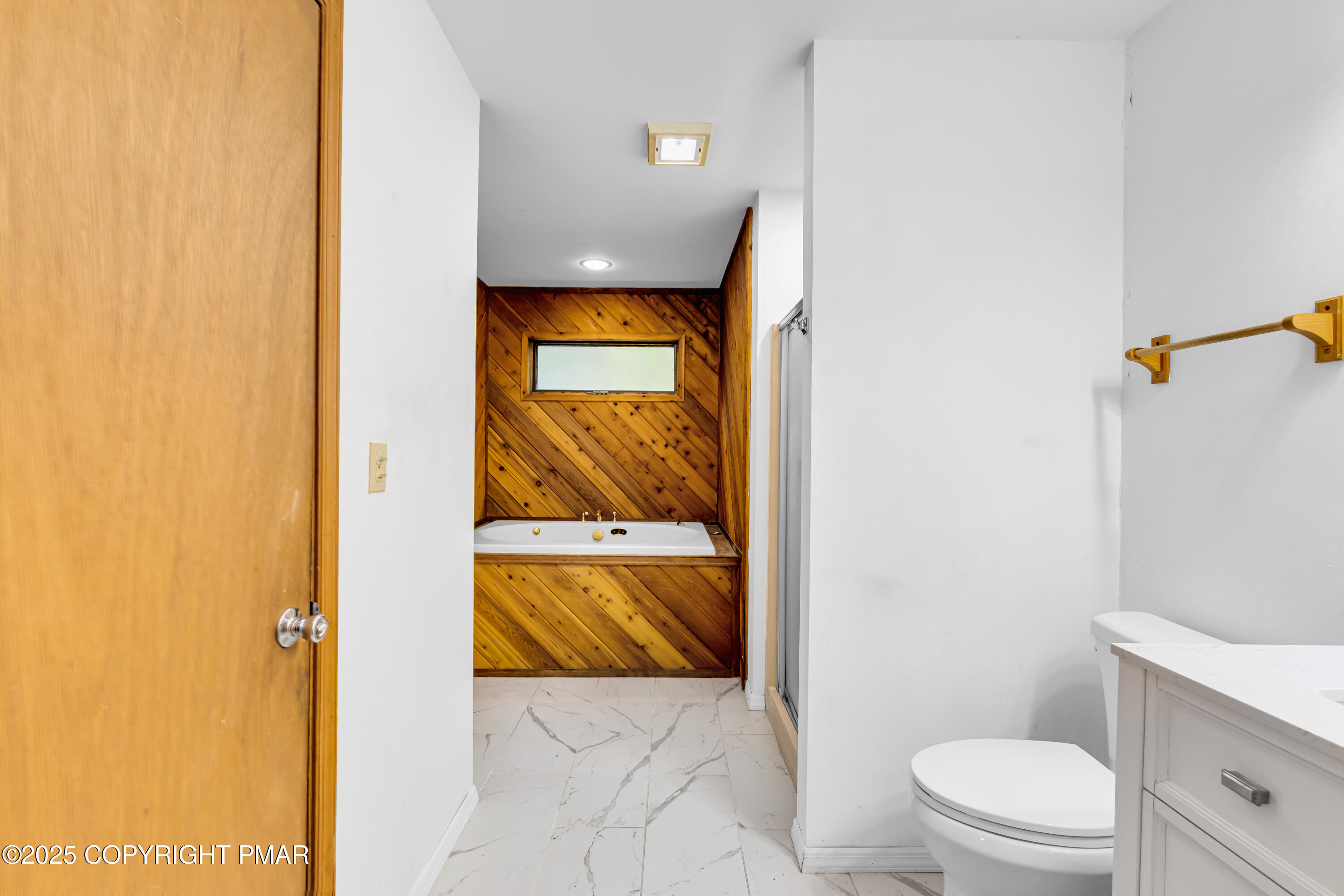 106 Carnforth Drive Bushkill, PA 18324 - Photo 17 of 73 a bathroom with a toilet sink and mirror
