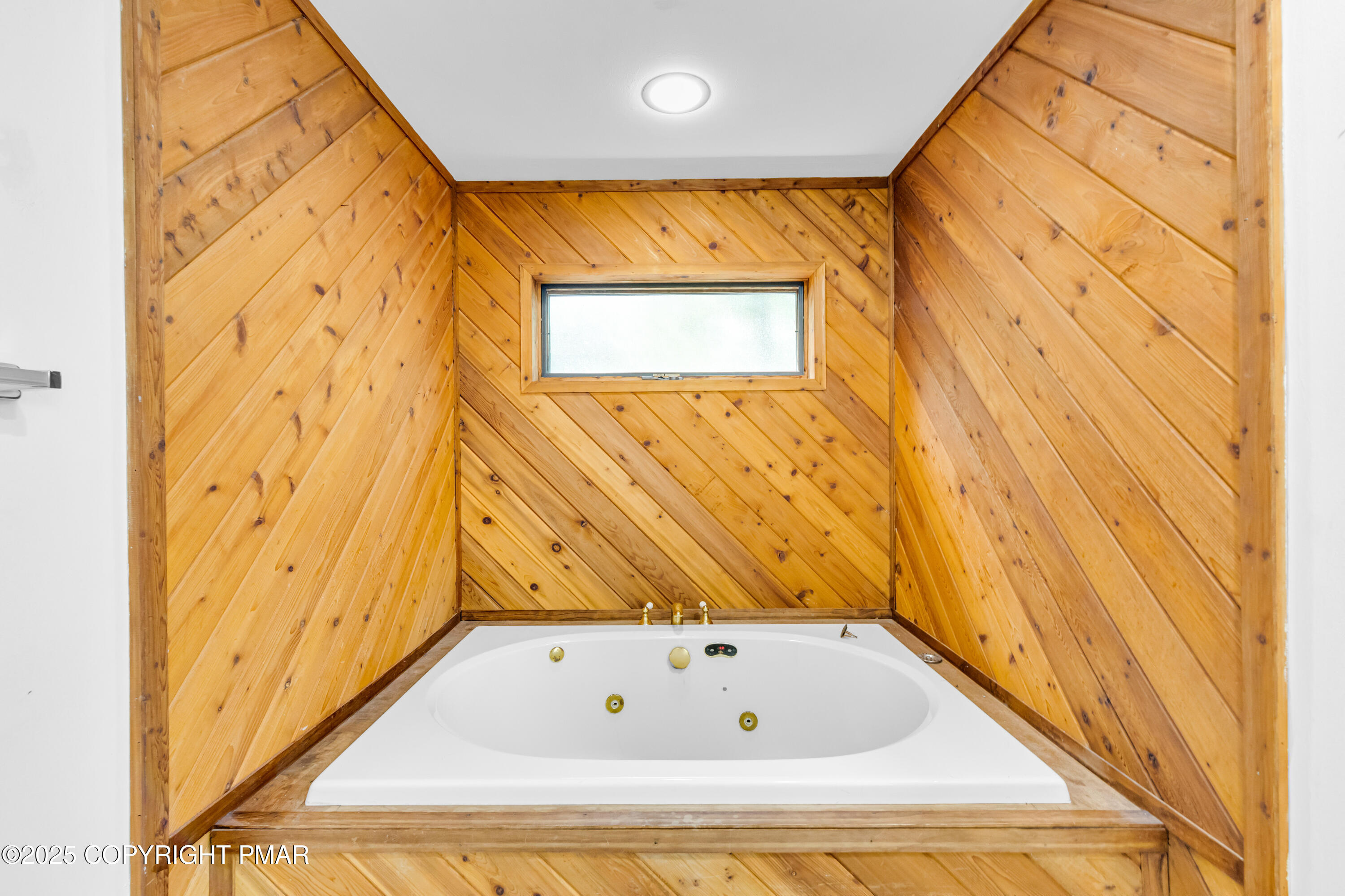 106 Carnforth Drive Bushkill, PA 18324 - Photo 18 of 73 a bathroom with a tub and shower