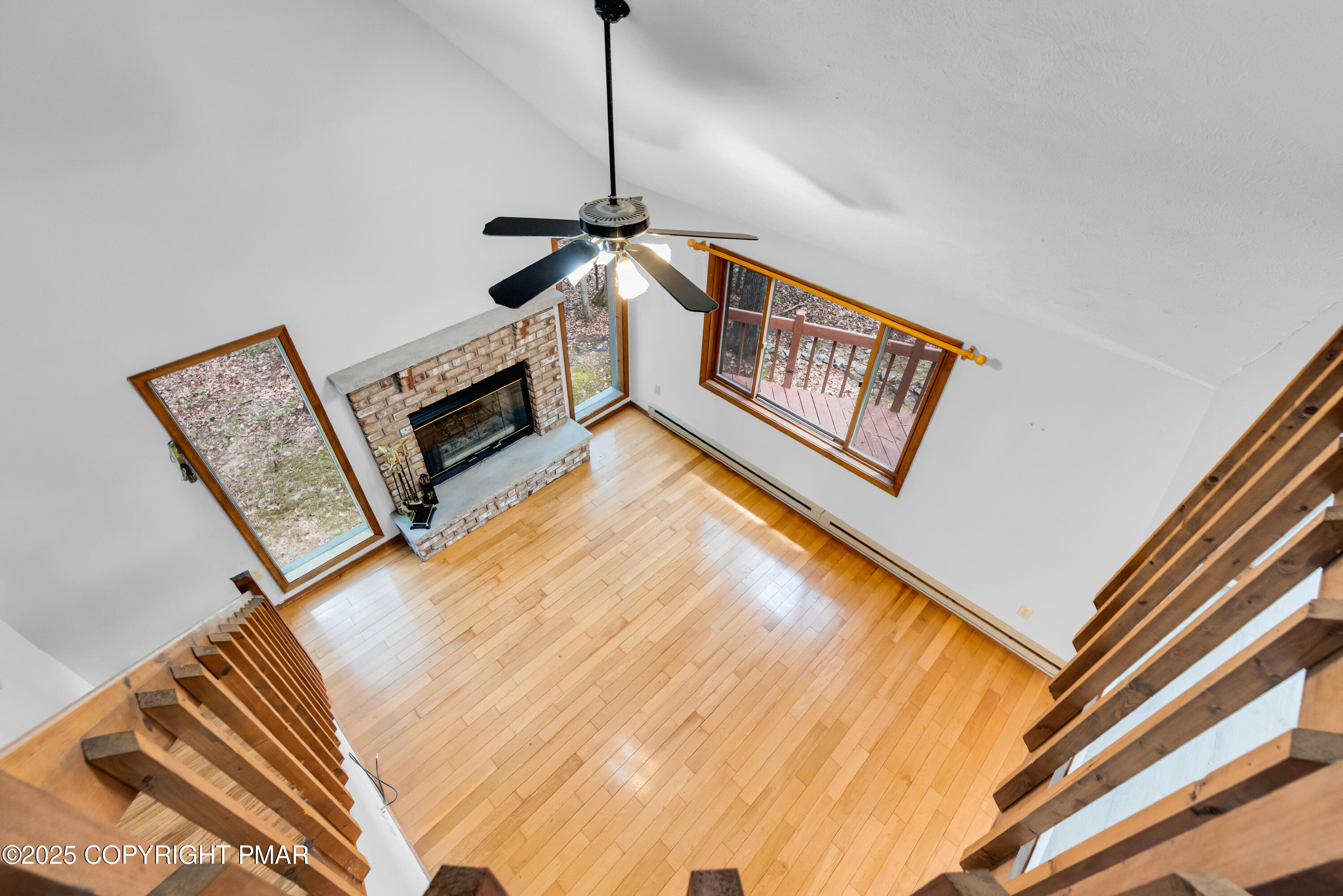 106 Carnforth Drive Bushkill, PA 18324 - Photo 23 of 73 a view of an empty room with wooden floor