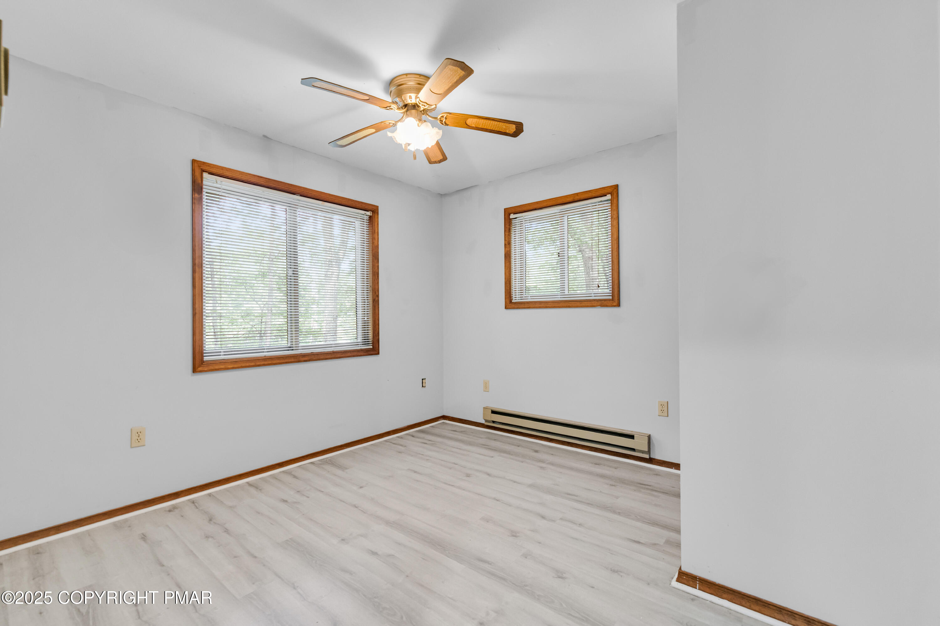 106 Carnforth Drive Bushkill, PA 18324 - Photo 28 of 73 a view of empty room with wooden floor