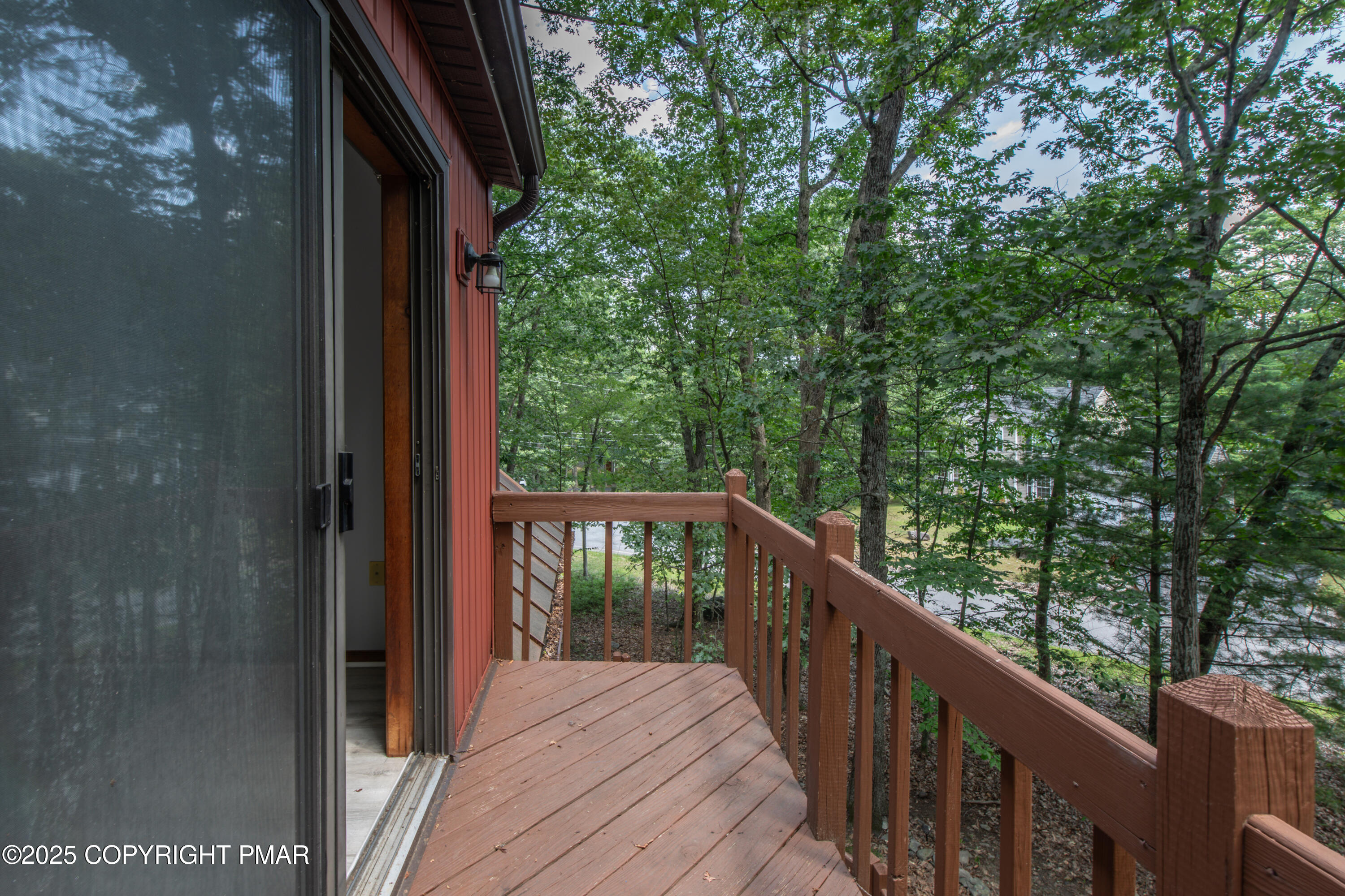 106 Carnforth Drive Bushkill, PA 18324 - Photo 36 of 73 a balcony with wooden floor in outdoor space