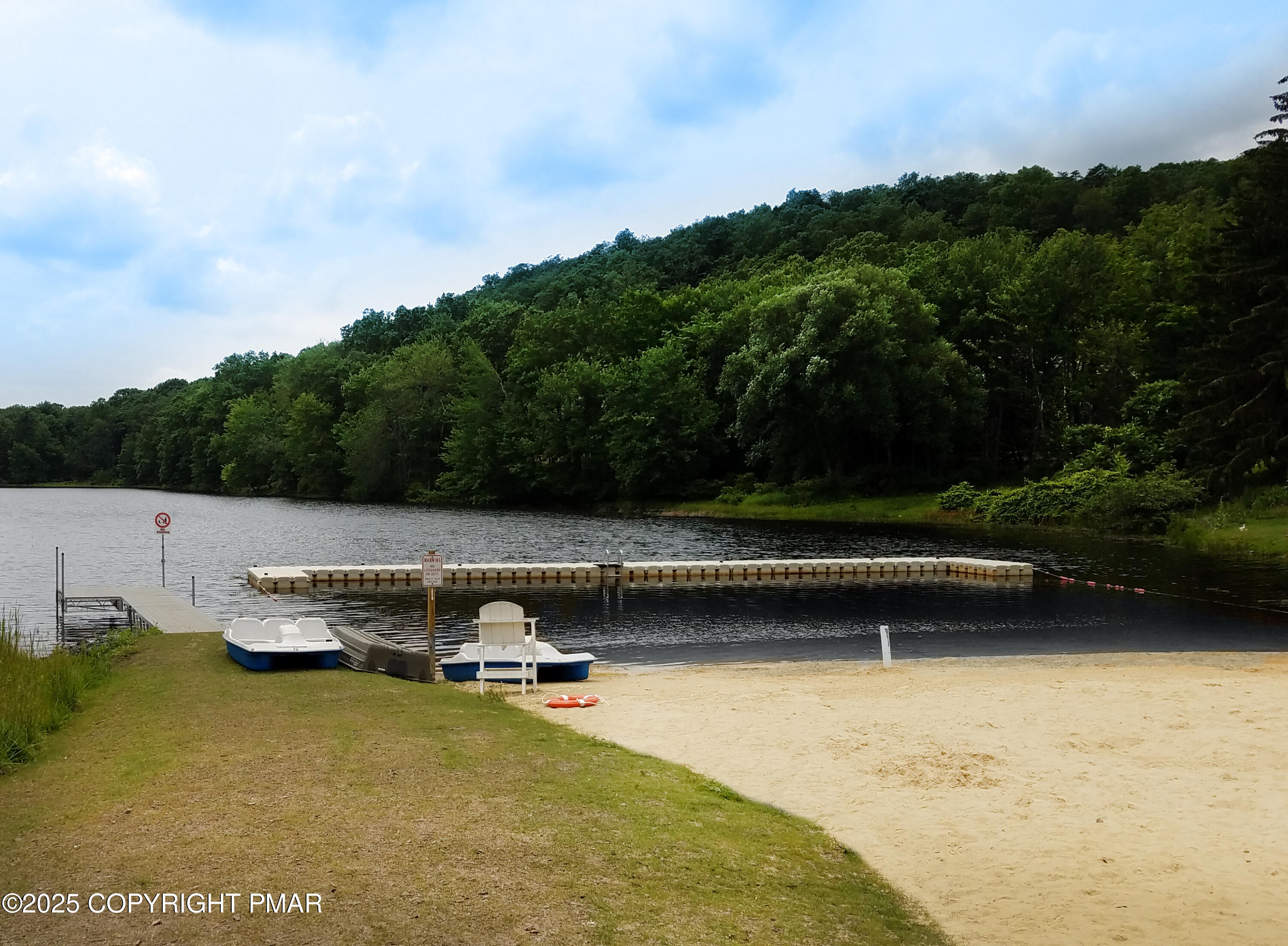 106 Carnforth Drive Bushkill, PA 18324 - Photo 52 of 73 a view of a lake with a mountain
