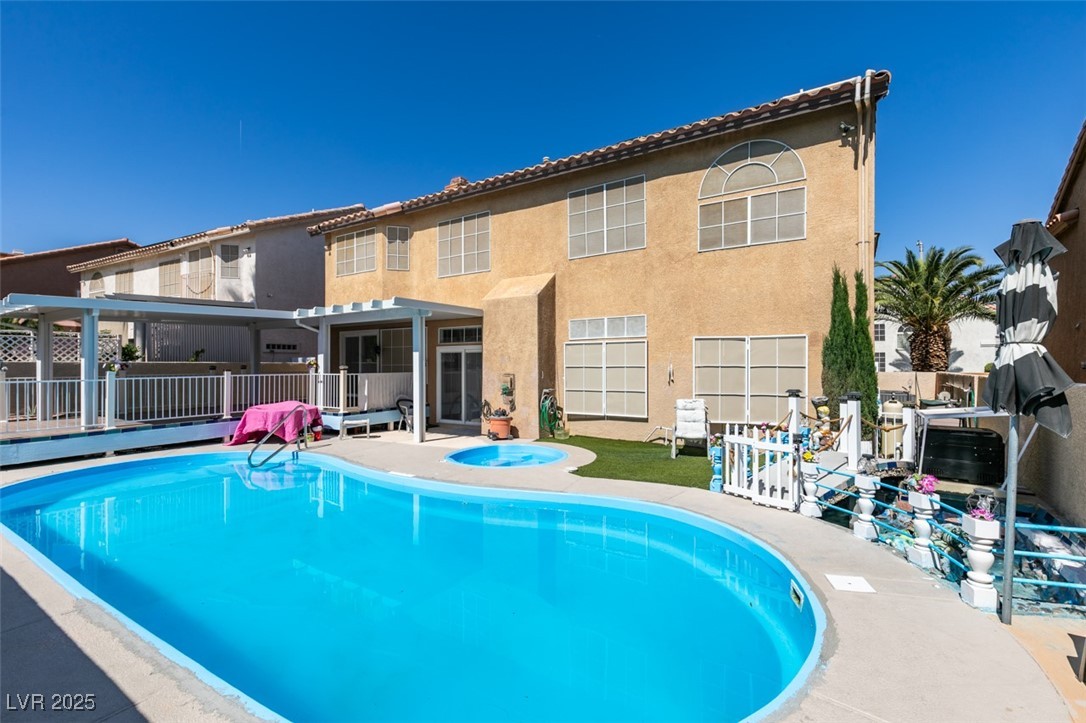 6 High Sierra Henderson, NV 89074 - Photo 52 of 56 View of swimming pool with a wooden deck