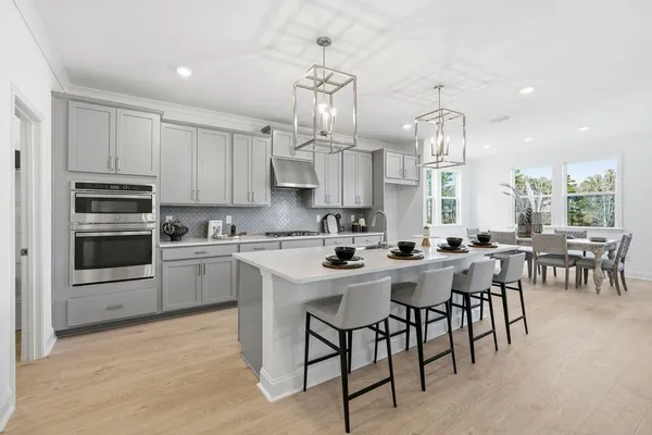 a living room with furniture and a table