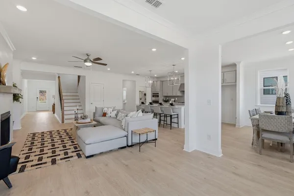 a spacious bedroom with a bed and a window