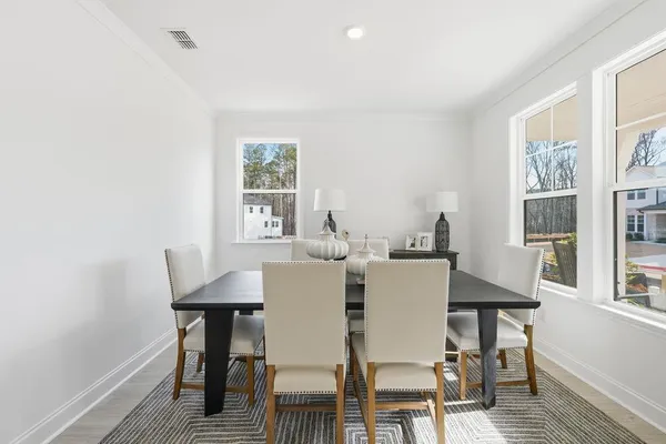 a bathroom with a double vanity sink mirror double and bathtub