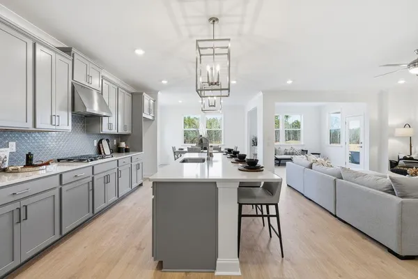 a kitchen with counter space appliances and cabinets