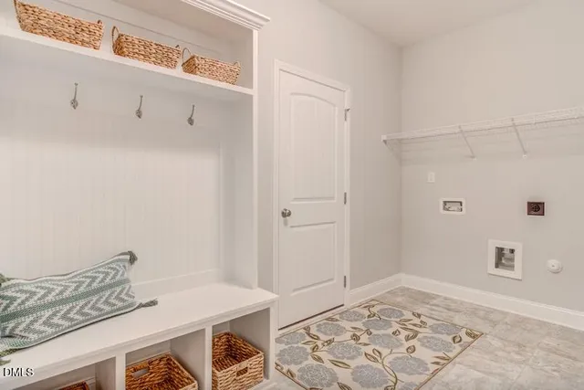 a view of a bedroom with bed and hallway
