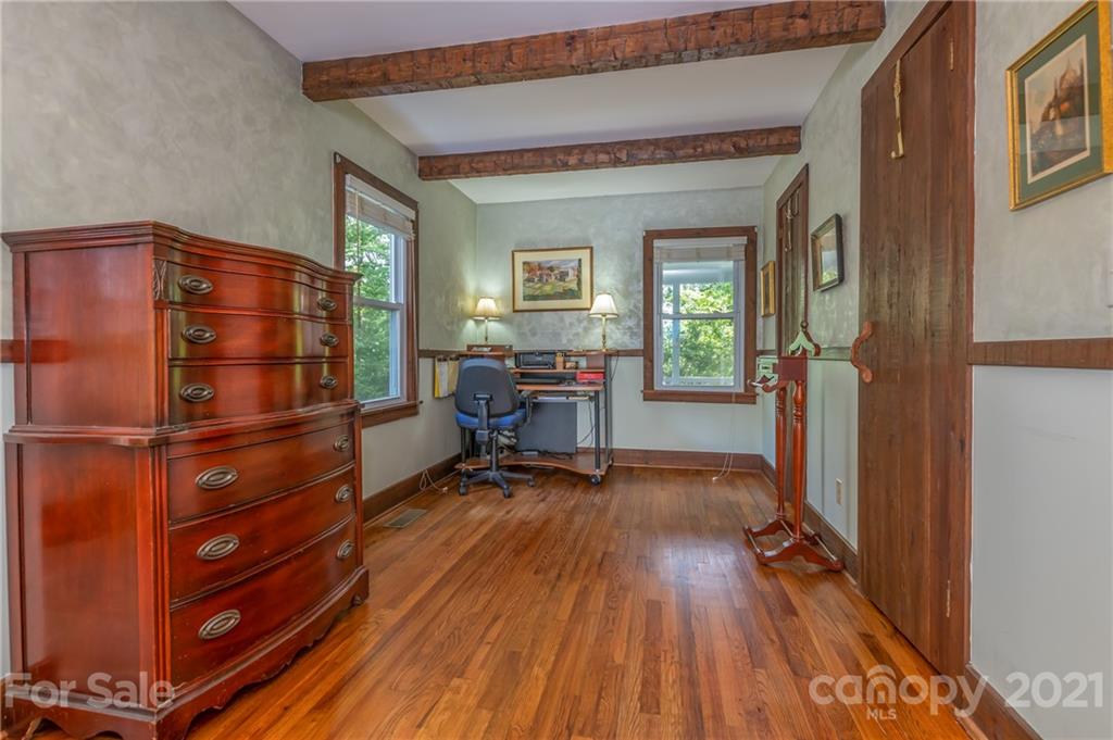 75 Hidden Hill Road Tryon, NC 28782 - Photo 26 of 36 a view of a room with wooden floor and furniture