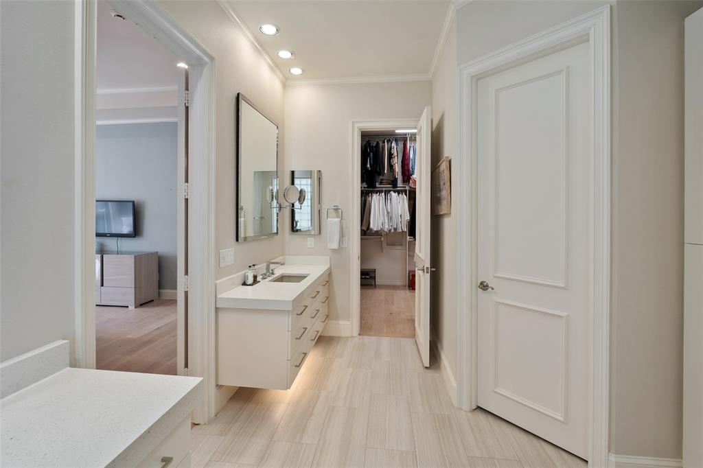 14725 Celestial Place Addison, TX 75254 - Photo 7 of 30 Primary Ensuite with Water Closet, Skylight and Large Walk-In Closet with Skylight