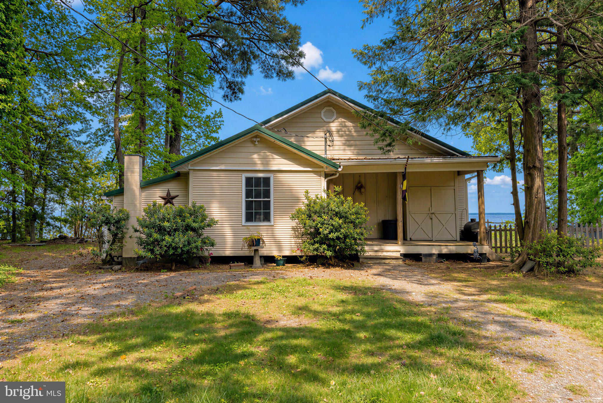 42195 White Point Beach Road Leonardtown, MD 20650 - Photo 29 of 57 Charming home embraced by nature.