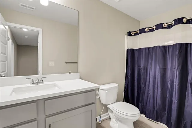 an empty room with closet area