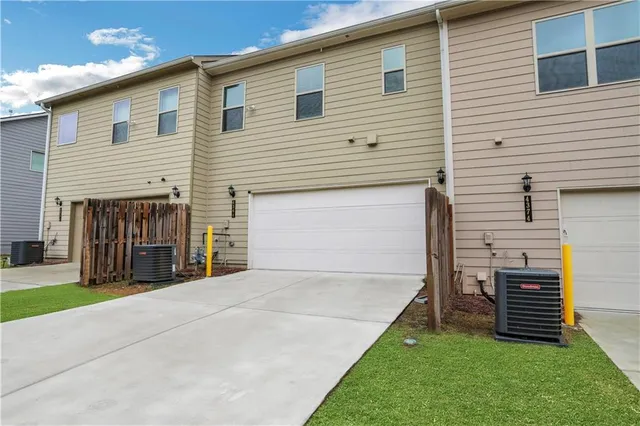 a view of the house with a garage